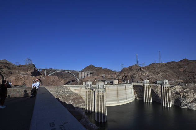 June 30, 2026 - Boulder City, Nevada, U.S. - Hoover Dam is seen on the border between Arizona and Nevada on June 30, 2026 near Boulder City, Nevada. Hoover Dam, completed in 1936, impounds Lake Mead, the largest reservoir in the United States by volume. Almost the entire Southwest of the United States is mired in various stages of drought. A federal study released on June 15 is projecting an almost 30-foot drop in Lake Mead water levels over the next two years. Boulder City USA - ZUMAbk3_ 20260630_zaf_bk3_016 Copyright: xDavidxBeckerx