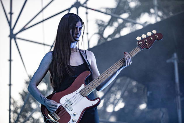 July 2, 2026, Soliera, Emilia Romagna, Italy: Samira Zahidi, bassist of the British post-punk band The Underground Youth performs on stage during a concert. Singer and guitarist Craig Dyer performed on stage at Piazza Lusvardi in Soliera (Modena) during a concert by British post-punk band The Underground Youth. The event marked the opening night of the nineteenth edition of the Arti Vive Festival. Soliera Italy  - ZUMAs197 20260702_aaa_s197_417 Copyright: xCarloxVerganix