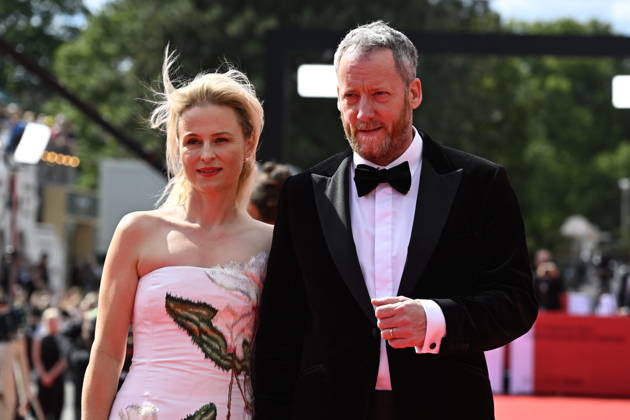 Executive Director of the festival Krystof Mucha, right, and his wife Darina Muchova, left, arrive at the opening of the 60th Karlovy Vary International Film Festival, on June 3, 2026, in Karlovy Vary, Czech Republic. (CTKxPhoto KaterinaxSulova) CTKPhotoP2026070306154  CTKPhotoP2026070306154