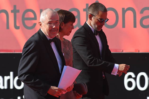 From left: moderator Marek Eben, archaeologist Andrea Bartoskova, and actor Jan Janek Bartoska arrive at the opening of the 60th Karlovy Vary International Film Festival, on June 3, 2026, in Karlovy Vary, Czech Republic. (CTKxPhoto SlavomirxKubes) CTKPhotoP2026070306553  CTKPhotoP2026070306553