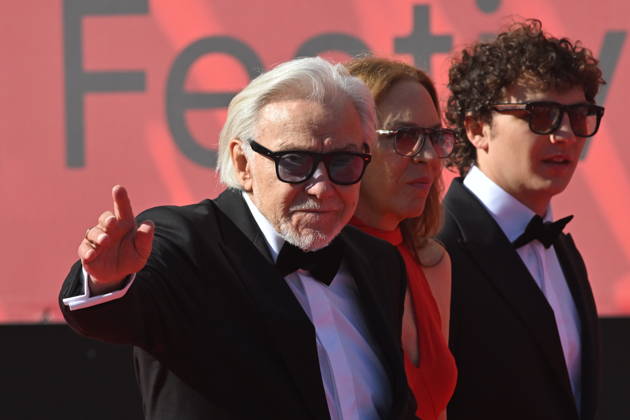 From left, American actor Harvey Keitel, his wife Daphna Kastner and son Roman Keitel arrive at the opening of the 60th Karlovy Vary International Film Festival, on June 3, 2026, in Karlovy Vary, Czech Republic. (CTKxPhoto SlavomirxKubes) CTKPhotoP2026070306622  CTKPhotoP2026070306622