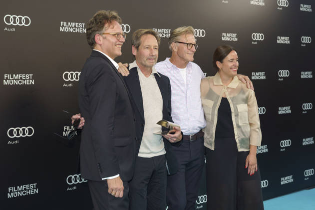 Christoph Gröner, David Duchovny, John Lee Hancock und Julia Weigl beim Photocall zur Verleihung des CineMerit Awards auf dem 43. Filmfest München 2026 in der Hochschule für Fernsehen und Film. München, 04.07.2026