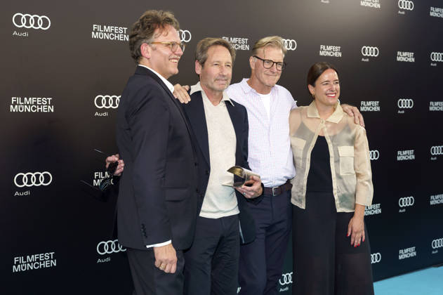Christoph Gröner, David Duchovny, John Lee Hancock und Julia Weigl beim Photocall zur Verleihung des CineMerit Awards auf dem 43. Filmfest München 2026 in der Hochschule für Fernsehen und Film. München, 04.07.2026