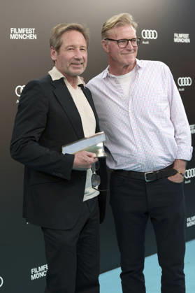 David Duchovny und John Lee Hancock beim Photocall zur Verleihung des CineMerit Awards auf dem 43. Filmfest München 2026 in der Hochschule für Fernsehen und Film. München, 04.07.2026