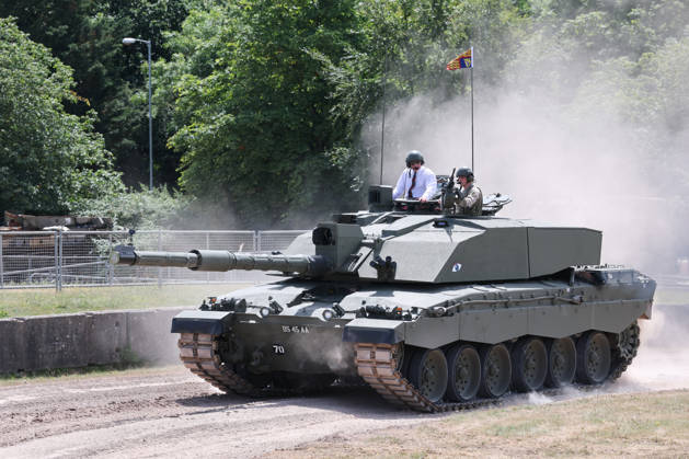 King Charles visits the Royal Tank Regiment s Families Day BOVINGTON, DORSET - JULY 06: King Charles III rides in a Challenger 3 Main Battle Tank during The Royal Tank Regiment s Families Day at the Tank Museum on July 06, 2026 in Bovington, Dorset. (Photo by Chris Jackson Getty Images)King Charles visits the Royal Tank Regiment s Families Day at the Tank Museum, Bovington, Dorset, UK, on the 6th July 2026. Picture by Chris Jackson WPA-Pool Bovington Tank Museum Dorset United Kingdom  WHA-0830