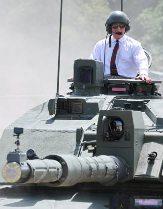 King Charles visits the Royal Tank Regiment s Families Day BOVINGTON, DORSET - JULY 06: King Charles III rides in a Challenger 3 Main Battle Tank during The Royal Tank Regiment s Families Day at the Tank Museum on July 06, 2026 in Bovington, Dorset. (Photo by Chris Jackson Getty Images)King Charles visits the Royal Tank Regiment s Families Day at the Tank Museum, Bovington, Dorset, UK, on the 6th July 2026. Picture by Chris Jackson WPA-Pool Bovington Tank Museum Dorset United Kingdom  WHA-0830