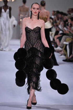 PFW - Tamara Ralph Runway in Paris FA A model walks the runway the Autumn-Winter 2027 2028 couture collection by Tamara Ralph during the Paris Fashion Week, on July 6, 2026. Photo by Firas Abdullah ABACAPRESS.COM Paris Ile-de-France France  Copyright: xAbdullahxFiras ABACAx