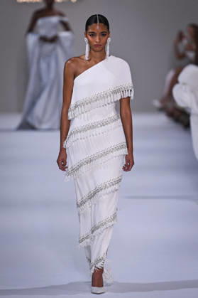 PFW - Tamara Ralph Runway in Paris FA A model walks the runway the Autumn-Winter 2027 2028 couture collection by Tamara Ralph during the Paris Fashion Week, on July 6, 2026. Photo by Firas Abdullah ABACAPRESS.COM Paris Ile-de-France France  Copyright: xAbdullahxFiras ABACAx