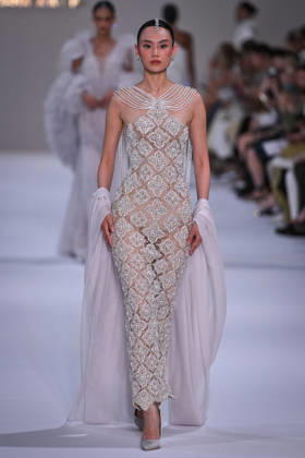PFW - Tamara Ralph Runway in Paris FA A model walks the runway the Autumn-Winter 2027 2028 couture collection by Tamara Ralph during the Paris Fashion Week, on July 6, 2026. Photo by Firas Abdullah ABACAPRESS.COM Paris Ile-de-France France  Copyright: xAbdullahxFiras ABACAx