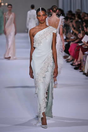 PFW - Tamara Ralph Runway in Paris FA A model walks the runway the Autumn-Winter 2027 2028 couture collection by Tamara Ralph during the Paris Fashion Week, on July 6, 2026. Photo by Firas Abdullah ABACAPRESS.COM Paris Ile-de-France France  Copyright: xAbdullahxFiras ABACAx