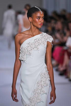 PFW - Tamara Ralph Runway in Paris FA A model walks the runway the Autumn-Winter 2027 2028 couture collection by Tamara Ralph during the Paris Fashion Week, on July 6, 2026. Photo by Firas Abdullah ABACAPRESS.COM Paris Ile-de-France France  Copyright: xAbdullahxFiras ABACAx