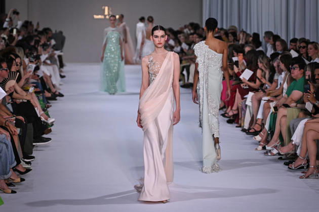PFW - Tamara Ralph Runway in Paris FA A model walks the runway the Autumn-Winter 2027 2028 couture collection by Tamara Ralph during the Paris Fashion Week, on July 6, 2026. Photo by Firas Abdullah ABACAPRESS.COM Paris Ile-de-France France  Copyright: xAbdullahxFiras ABACAx