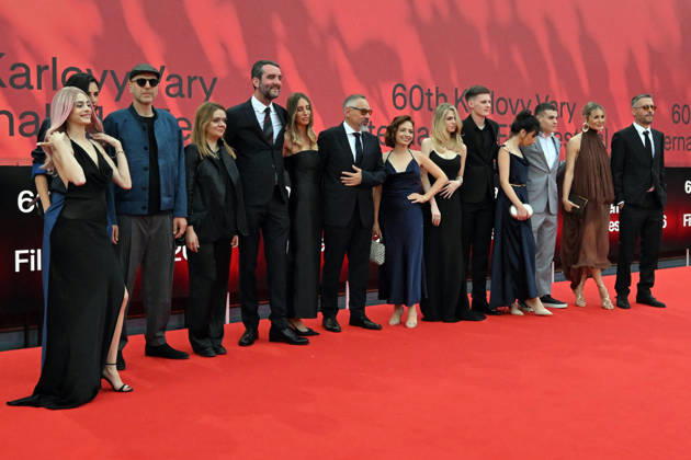 The 60th Karlovy Vary International Film Festival continued on its fifth day, in Karlovy Vary, Czech Republic, on July 7, 2026. A delegation of filmmakers presented the competition film Three Weeks Later (Serbia, Bulgaria, Italy, Croatia, Luxembourg) in the Grand Ballroom of the Thermal Hotel. Director Miroslav Terzic is standing in the middle (wearing glasses and a goatee beard). (CTKxPhoto SlavomirxKubes) CTKPhotoP2026070709521  CTKPhotoP2026070709521