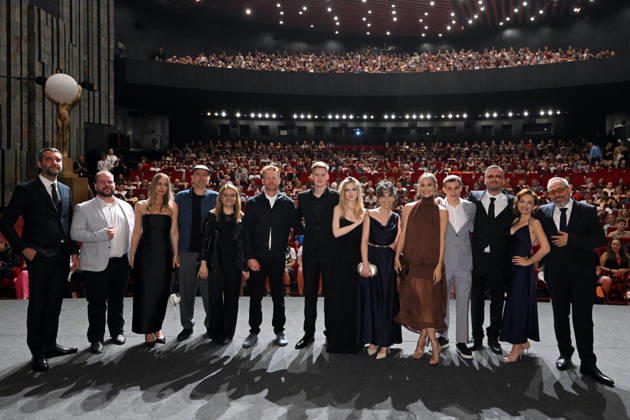The 60th Karlovy Vary International Film Festival continued on its fifth day, in Karlovy Vary, Czech Republic, on July 7, 2026. A delegation of filmmakers presented the competition film Three Weeks Later (Serbia, Bulgaria, Italy, Croatia, Luxembourg) in the Grand Ballroom of the Thermal Hotel. Director Miroslav Terzic is standing right (wearing glasses and a goatee beard). (CTKxPhoto SlavomirxKubes) CTKPhotoP2026070709544  CTKPhotoP2026070709544