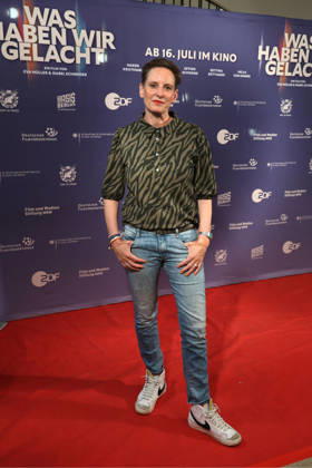 Okka Gundel attends the premiere of the documentary film Was Haben Wir Gelacht on July 7, 2026, at the Cineplex Filmpalast in Cologne, Germany Premiere of the documentary film Was Haben Wir Gelacht at the Cineplex Filmpalast in Cologne, Germany