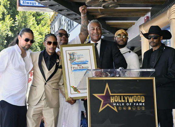 Bizzy Bone, Layzie Bone, Wish Bone, Flesh-n-Bone and Krayzie Bone (L-R) of the Hip-Hop group Bone Thugs-N-Harmony receive an honors certificate from the city of Los Angeles during a ceremony honoring them with the 2,851st star on the Hollywood Walk of Fame in Los Angeles on Wednesday, July 8, 2026.  LAP20260708010 JIMxRUYMEN