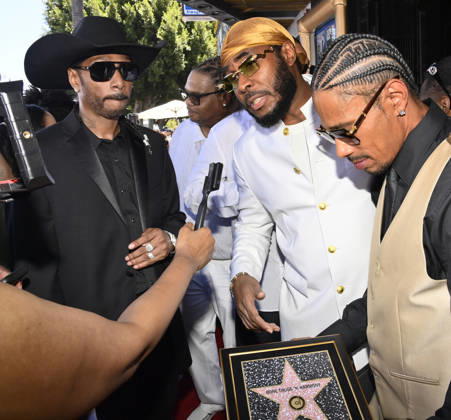 Krayzie Bone, Flesh-n-Bone and Layzie Bone (L-R) of the Hip-Hop group Bone Thugs-N-Harmony speak with reporters during a ceremony honoring them with the 2,851st star on the Hollywood Walk of Fame in Los Angeles on Wednesday, July 8, 2026.  LAP2026070804 JIMxRUYMEN