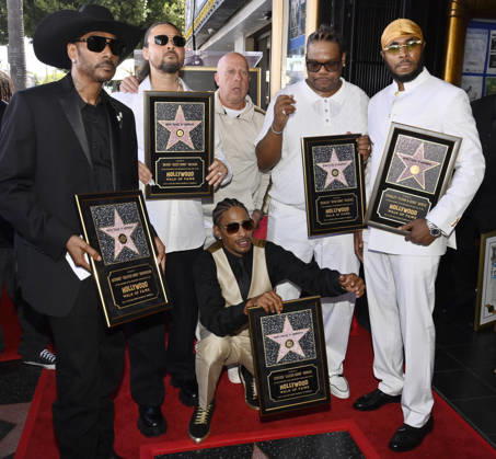 Krayzie Bone, Bizzy Bone, Layzie Bone, Wish Bone and Flesh-n-Bone (L-R) of the Hip-Hop group Bone Thugs-N-Harmony hold replica plaques during a ceremony honoring them with the 2,851st star on the Hollywood Walk of Fame in Los Angeles on Wednesday, July 8, 2026.  LAP2026070823 JIMxRUYMEN