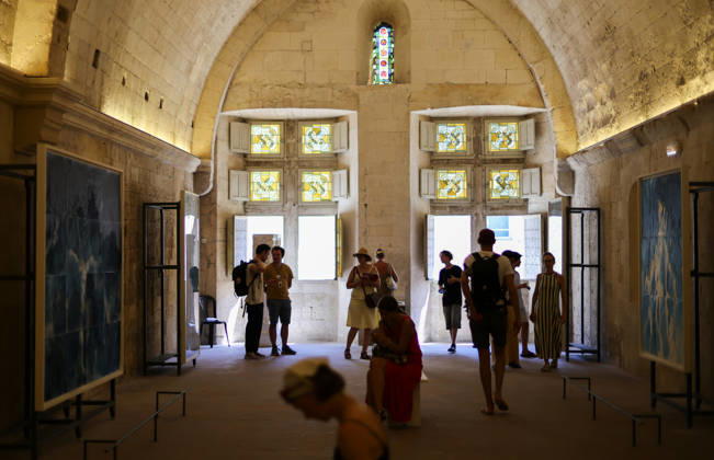 (260709) -- ARLES, July 9, 2026 -- People view exhibits during an exhibition at the Rencontres d Arles photography festival in Arles, France, July 8, 2026. The 57th Rencontres d Arles photography festival lasts from July 6 to October 4. ) FRANCE-ARLES-RENCONTRES D ARLES-PHOTOGRAPHY FESTIVAL-EXHIBITION WuxHuiwo 