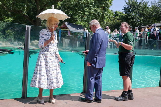 July 9, 2026, London, London, UK: London, UK. King Charles III holding a laser pointer to attract Humboldt penguins at Penguin Beach during a visit to London Zoo marking the 200th anniversary of the Zoological Society of London. London UK - ZUMAl94_ 20260709_zaf_l94_016 Copyright: xDinendraxHariax