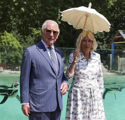 July 9, 2026, London, London, UK: London, UK. King Charles III and Queen Camilla pose after observing laser training exercises with Humboldt penguins at Penguin Beach during their visit to London Zoo to mark the 200th anniversary of the Zoological Society of London. London UK - ZUMAl94_ 20260709_zaf_l94_022 Copyright: xDinendraxHariax
