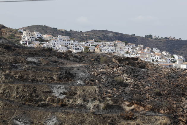 Deadly wildfire scorches Almeria province in Spain LOS GALLARDOS, SPAIN - JULY 11: Emergency operations continue near Bedar as security forces restrict access to the wildfire-affected area and direct local residents away from danger in Almeria province, Spain, on July 11, 2026. Firefighters, supported by helicopters and other emergency teams, carry out containment, surveillance and recovery operations across the burned landscape, while roads leading toward the fire zone remain under security control. Improved weather conditions helped crews gain the upper hand over the blaze and intensify efforts to prevent it from spreading further. The wildfire killed at least 12 people and burned about 6,600 hectares of forest, farmland and surrounding r Copyright: x2026xAnadoluxPabloxMiranzox