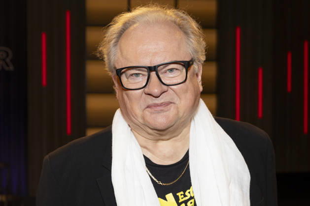 Saenger, Schriftsteller Heinz-Rudolf KUNZE, freundlich, schmunzelnd, mit weissem Schal, Portrait, Portraet, zu Gast in der TV Sendung ,,Koelner Treff,, im WDR Fernsehen, Aufzeichnung am 10.07.2026, Ausstrahlung am 07.08.2026.