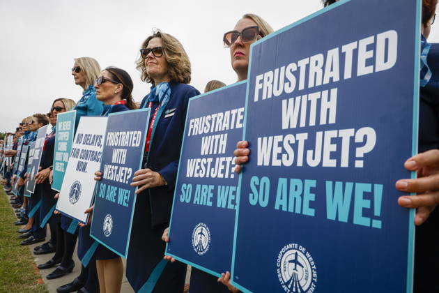 July 14, 2026, Calgary, Ab, CANADA: WestJet flight attendants hold a Day of Action while union members vote on a possible strike in Calgary, Tuesday, July 14, 2026. Calgary CANADA  - ZUMAc35_ 20260714_zaf_c35_043 Copyright: xJeffxMcintoshx