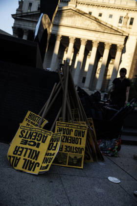 July 14, 2026, New York, New York, USA: Signs are seen during a protest. Protesters gather and demand justice for Lorenzo Salgado Araujo, 52, a man shot and killed by Immigration and Customs Enforcement (ICE). Protesters call for a full investigation into the fatal shooting and demand an end to local collaboration with ICE. New York USA - ZUMAh182 20260714_znp_h182_010 Copyright: xMatthewxHoenx