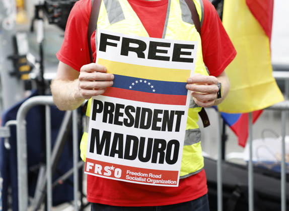 Protesters gather outside at Manhattan Court where ousted Venezuelan President Nicolas Maduro will appear for a hearing on Wednesday, July 22, 2026 in New York City. Venezuela s ousted President Nicolas Maduro and his ?wife ?Cilia Flores are back in a U.S. ?court on Wednesday for a hearing over the upcoming schedule in their drug trafficking case, including a possible ?June 2027 trial start date.  NYP20260722101 JOHNxANGELILLO