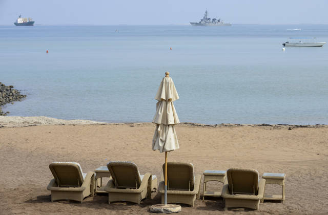 Djibouti city, red sea, Bab al-Mandab DJIBOUTI city, Red Sea, view to anchorage wirh cargo ships and naval ship fighting against piracy, Djibouti is an strategic point, China, USA and France have military bases here