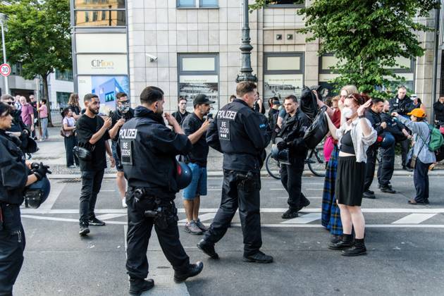 August 2, 2026, Berlin, Germany: BERLIN, Germany Ã¢â‚¬ August 2, 2026: Thousands of people gather at Neptunebrunnen under the slogan Ã¢â‚¬oeFrom Grief to Anger to ResistanceÃ¢â‚¬Â to condemn the recent attack at Berlin Pride. The peaceful march continued to the Brandenburg Gate with participants carrying banners, posters, and drums. Police arrested one suspect near the demonstration who was carrying a German flag and fireworks. Berlin Germany - ZUMAq101 20260802_zna_q101_182 Copyright: xAndro SxTrujillox