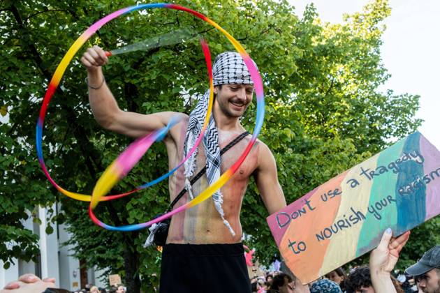 August 2, 2026, Berlin, Germany: BERLIN, Germany Ã¢â‚¬ August 2, 2026: Thousands of people gather at Neptunebrunnen under the slogan Ã¢â‚¬oeFrom Grief to Anger to ResistanceÃ¢â‚¬Â to condemn the recent attack at Berlin Pride. The peaceful march continued to the Brandenburg Gate with participants carrying banners, posters, and drums. Police arrested one suspect near the demonstration who was carrying a German flag and fireworks. Berlin Germany - ZUMAq101 20260802_zna_q101_187 Copyright: xAndro SxTrujillox