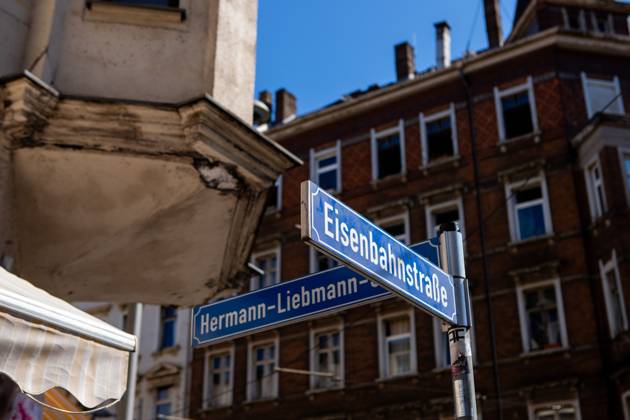 August 8, 2026, Leipzig, Saxony, Germany: LEIPZIG, GERMANY - AUGUST 8, 2026: EisenbahnstraoŸe, in Leipzigâ€⠢s eastern district, is a vivid reflection of the cityâ€⠢s multicultural character. Along this busy street, everyday life unfolds around international grocery stores, small businesses and local services, with Arabic and German signs sharing the same storefronts. At the Hermann-Liebmann- EisenbahnstraoŸe stop, shoppers pause with their bags and trolleys, while others wait for the tram or go about their daily routines. The streetâ€⠢s diverse shops and clientele reflect the many communities that have made this part of Leipzig their home, creating a distinctly international atmosphere where different languages, cultures - ZUMAq101 20260808_zna_q101_058 Copyright: xMariaxCastrox