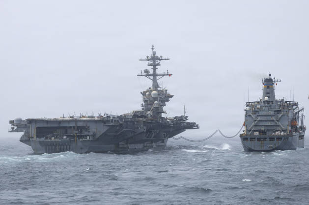 August 18, 2026, Undisclosed Location, United States: The U.S. Navy Nimitz-class aircraft carrier USS Abraham Lincoln conducts a replenishment-at-sea with fleet replenishment oiler USNS Henry J. Kaiser, right, during Operation Epic Fury, August 16, 2026, from an undisclosed location. The Lincoln is in its ninth month at sea and has been deployed for more than 260 days. Undisclosed Location United States - ZUMAp138 20260818_zaa_p138_042 Copyright: xUsxNavy U.S.xNavyx