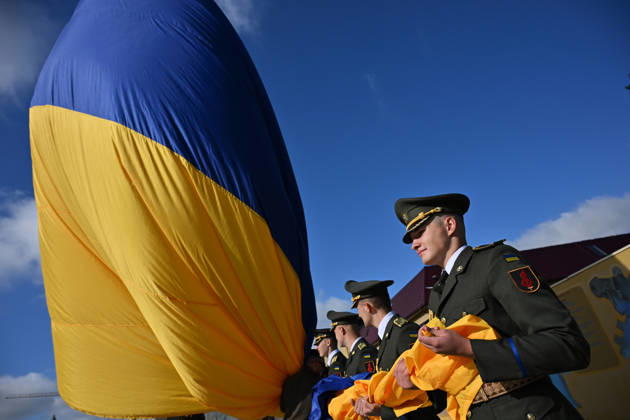 National Flag Day of Ukraine in Lviv LVIV, UKRAINE - AUGUST 23: Celebration of the National Flag Day of Ukraine during the Russian-Ukrainian War in Lviv, Ukraine on August 23, 2026. Due to the war, only the ceremonial raising of the Ukrainian flag on the highest flagpole in the city with the participation of soldiers from various branches of the armed forces took place. People also honored the fallen with a minute of silence, sang the Ukrainian anthem, and a military orchestra played several patriotic and folk songs. Michael Sorrow Anadolu Lviv Ukraine. Editorial use only. Please get in touch for any other usage.  Copyright: x2026xAnadoluxMichaelxSorrowx