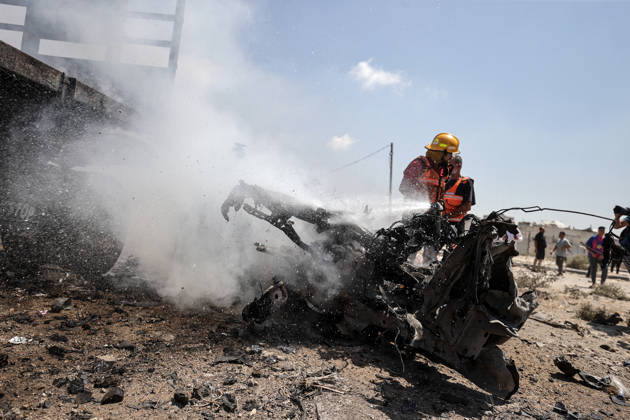 Israeli attacks on Gaza continue despite ceasefire GAZA STRIP, GAZA, PALESTINE - AUGUST 23: Firefighters intervene to extinguish several vehicles that caught fire following an Israeli airstrike that destroyed several homes and tents where displaced Palestinians were staying in Zuvayda, Gaza Strip, Palestine, on August 23, 2026. Ali Jadallah Anadolu Gaza Strip Gaza. Editorial use only. Please get in touch for any other usage.  Copyright: x2026xAnadoluxAlixJadallahx
