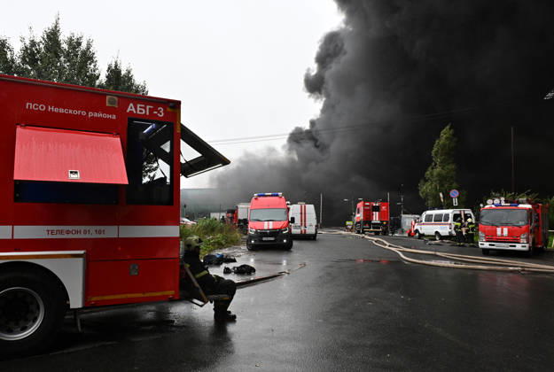 Fire breaks out at logistics center in St. Petersburg ST. PETERSBURG, RUSSIA - AUGUST 23: Firefighters respond to the area where a fire broke out at a logistics center as thick black smoke rises in St. Petersburg, Russia, on August 23, 2026. Boris Smirnov Anadolu Saint Petersburg Russia. Editorial use only. Please get in touch for any other usage.  Copyright: x2026xAnadoluxBorisxSmirnovx