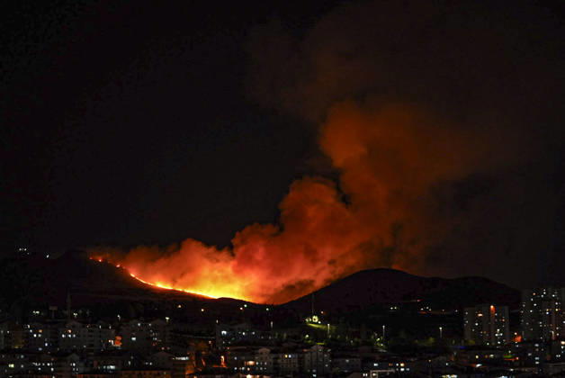 Firefighters respond to fire in wooded area in Ankara ANKARA, TURKIYE - AUGUST 23: Smoke rises from a wooded area in the Mamak district of Ankara, Turkiye on August 23, 2026, as firefighters work to extinguish the wide-scale fire using two fire trucks and three water tankers. Metin Aktas Anadolu Ankara Turkey. Editorial use only. Please get in touch for any other usage.  Copyright: x2026xAnadoluxMetinxAktasx
