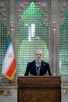 Iranian President Masoud Pezeshkian speaks during an event to mark the first day of the Government Week at the mausoleum of Ayatollah Ruhollah Khomeini, the founder of the Islamic Republic of Iran, in Tehran, Iran on August 23, 2026. Iranian President Masoud Pezeshkian declared that no power will be able to force the Iranian people into surrender. He dismissed claims that sanctions would turn Iran into another Venezuela, saying that has not happened. He stressed the need to begin conserving gasoline consumption through government measures, including a plan to reduce the number and fuel use of government vehicles.  IRN2026082302 IranianxPresidency