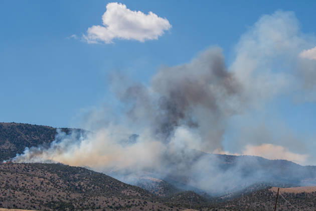 August 23, 2026, Elberta, Utah, USA: Smoke and flames are visible on a hillside as the Big Mountain Fire burns southwest of Elberta, Utah, United States, on August 23, 2026. State and local air and ground resources were deployed to fight the wildland fire, which rapidly reached an estimated 30 acres with zero containment. Elberta USA - ZUMAm292 20260823_znp_m292_023 Copyright: xCharlesxMcClintockxWilsonx