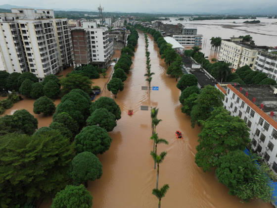 NINGMING, CHINA - AUGUST 23: Residents evacuate in an orderly manner as flooding hits Chengzhong Town of Ningming County due to a typhoon on August 23, 2026 in Ningming, Guangxi Zhuang Autonomous Region of China.  Copyright: xVCGx 111661703320