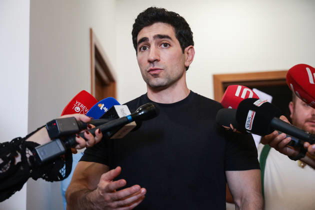 ARMENIA, YEREVAN - AUGUST 25, 2026: Levon Kocharyan, a member of the Armenia faction (Alliance Armenia) in the National Assembly of Armenia and son of former Armenian President Robert Kocharyan (1998-2008) talks to the media outside his apartment. The Armenian Anti-Corruption Committee accuses Robert Kocharyan of using his official position to acquire property at a price below its market value. Alexander Patrin TASS  96625092