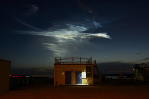 The exhaust plume shines in the dawn sky following the launch of the SpaceX Falcon 9 rocket from Cape Canaveral Space Force Station, Florida on Tuesday August 25, 2026. SpaceX launched an additional 29 Starlink satellites at 5:33 AM from Launch Complex 40.  CCP20260825006 JOExMARINO