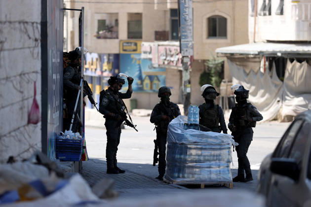 Israeli forces raid UNRWA s Kalendiya Education Center in East Jerusalem JERUSALEM - AUGUST 25 : Israeli forces raid the Qalandia Training Center belonging to the United Nations Relief and Works Agency for Palestine Refugees in the Near East (UNRWA) north of East Jerusalem on August 25, 2026. Israeli forces arrive to evacuate the center block surrounding streets and prevent local residents from approaching. Issam Rimawi Anadolu Jerusalem Palestinian Territory, Occupied. Editorial use only. Please get in touch for any other usage.  Copyright: x2026xAnadoluxIssamxRimawix