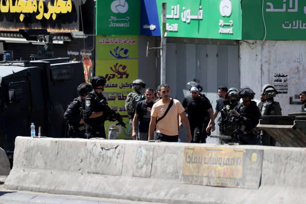 Israeli forces raid UNRWA s Kalendiya Education Center in East Jerusalem JERUSALEM - AUGUST 25 : Israeli forces raid the Qalandia Training Center belonging to the United Nations Relief and Works Agency for Palestine Refugees in the Near East (UNRWA) north of East Jerusalem on August 25, 2026. Israeli forces arrive to evacuate the center block surrounding streets and prevent local residents from approaching. Issam Rimawi Anadolu Jerusalem Palestinian Territory, Occupied. Editorial use only. Please get in touch for any other usage.  Copyright: x2026xAnadoluxIssamxRimawix