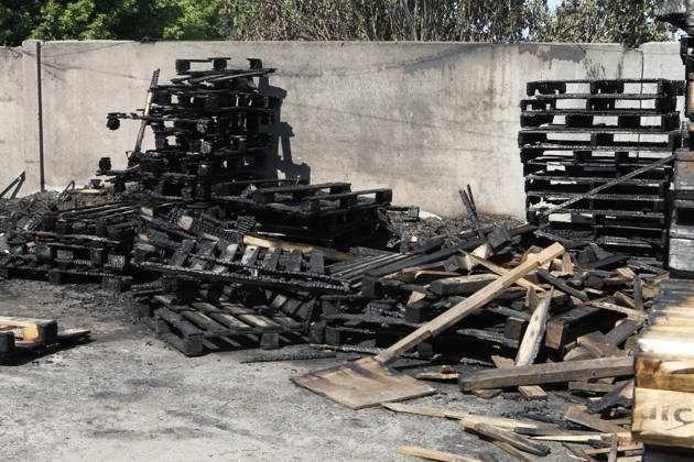 Burnt wooden pallets that caught fire as a result of a nighttime Russian UAV attack are in a parking lot near a shopping and entertainment centre in Dnipro, Ukraine, August 25, 2026. Fires broke out inside and near the shopping mall as a result of the Russian attack. (Photo by Mykola Miakshykov Ukrinform) Russian attack hits parking lot near shopping mall in Dnipro suburb  Copyright: xMykolaxMiakshykovx