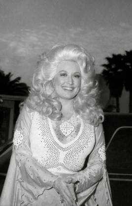 August 25, 2026: Dolly Parton, the Queen of Country singing icon with a personality as bold as her signature blond coif and rhinestone-encrusted outfits has died. She was 80 years old. FILE PHOTO SHOT ON: Feb. 19, 197: Los Angeles, California, USA - DOLLY PARTON.19TH GRAMMYS. Los Angeles USA - ZUMAg49_ 20030806_gaf_g105_275 Copyright: xNatexCutlerx