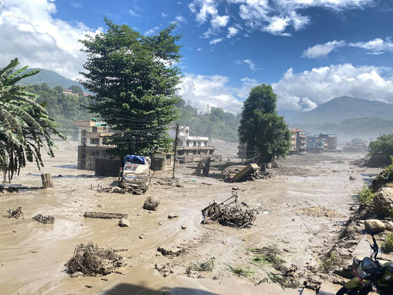 (260826) -- KATHMANDU, Aug. 26, 2026 -- This photo taken on Aug. 26, 2026 shows an area affected by flash floods in Nuwakot District, Nepal. The death toll from a massive flash flood in Nepal s Bhote Koshi River on Wednesday reached 22, the police said. The Nepal Tourism Board said that as many as 384 tourists, including 291 foreigners, have been reported missing after a massive flash flood swept through Rasuwa district in northern Nepal. ( via Xinhua) Photo Flash Death toll hits 22 in flash flood in Nepal: police RSS 