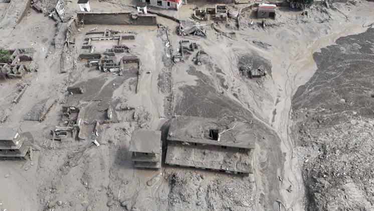 August 26, 2026, Nuwakot, Nepal: An aerial view shows buildings and infrastructure damaged along the swollen Trishuli River following a massive flash flood triggered by an avalanche of ice and rock in the upper Lhende River on the Tibetan side, in Nuwakot district, Nepal, on Wednesday, August 26, 2026. The sudden flood swept through communities along the Bhote Koshi and Trishuli river systems, destroying homes, roads and bridges and leaving widespread devastation downstream. Nuwakot Nepal  - ZUMAg200 20260826_zap_g200_019 Copyright: xSkandaxGautamx